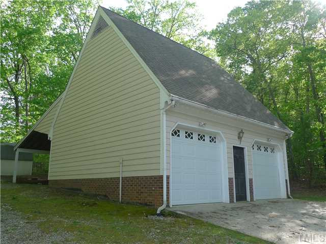 5205 Blue Stem Court Raleigh, NC 27606 - Photo 18 of 23 Detached Two-Car Garage with Covered Parking in the Back for a Boat Parking Lot/Garage
