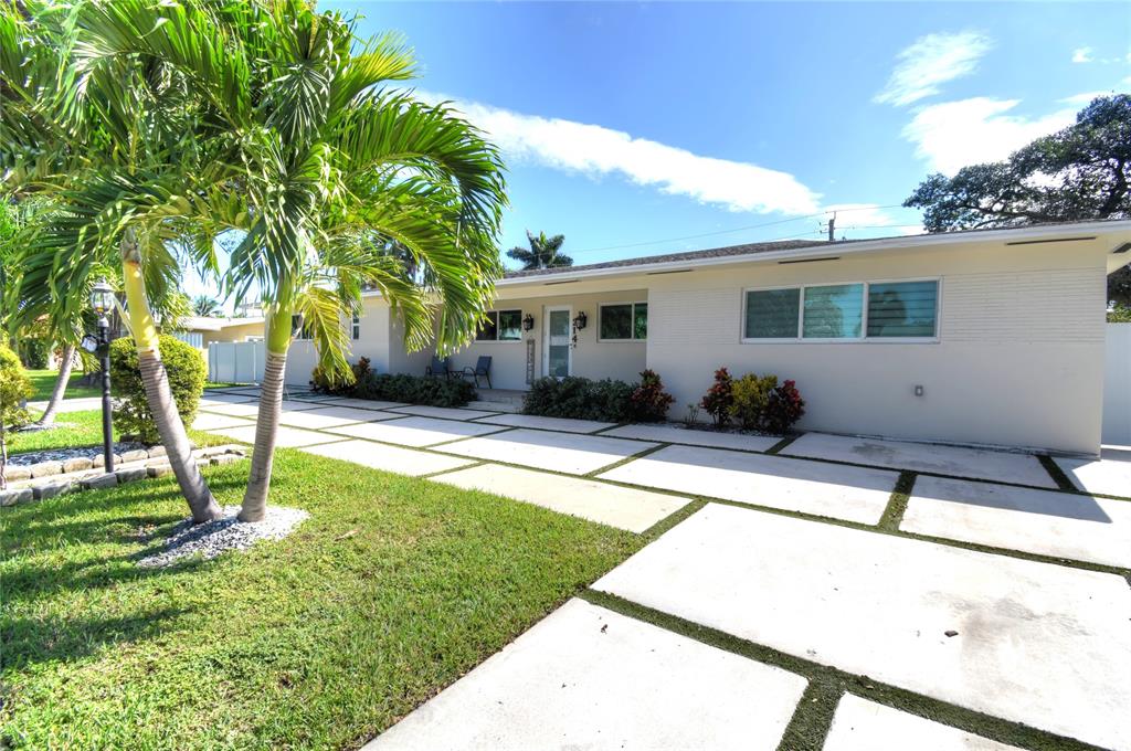 214 Southeast 5th Street Dania Beach, FL 33004 - Photo 2 of 50 a house view with a garden space