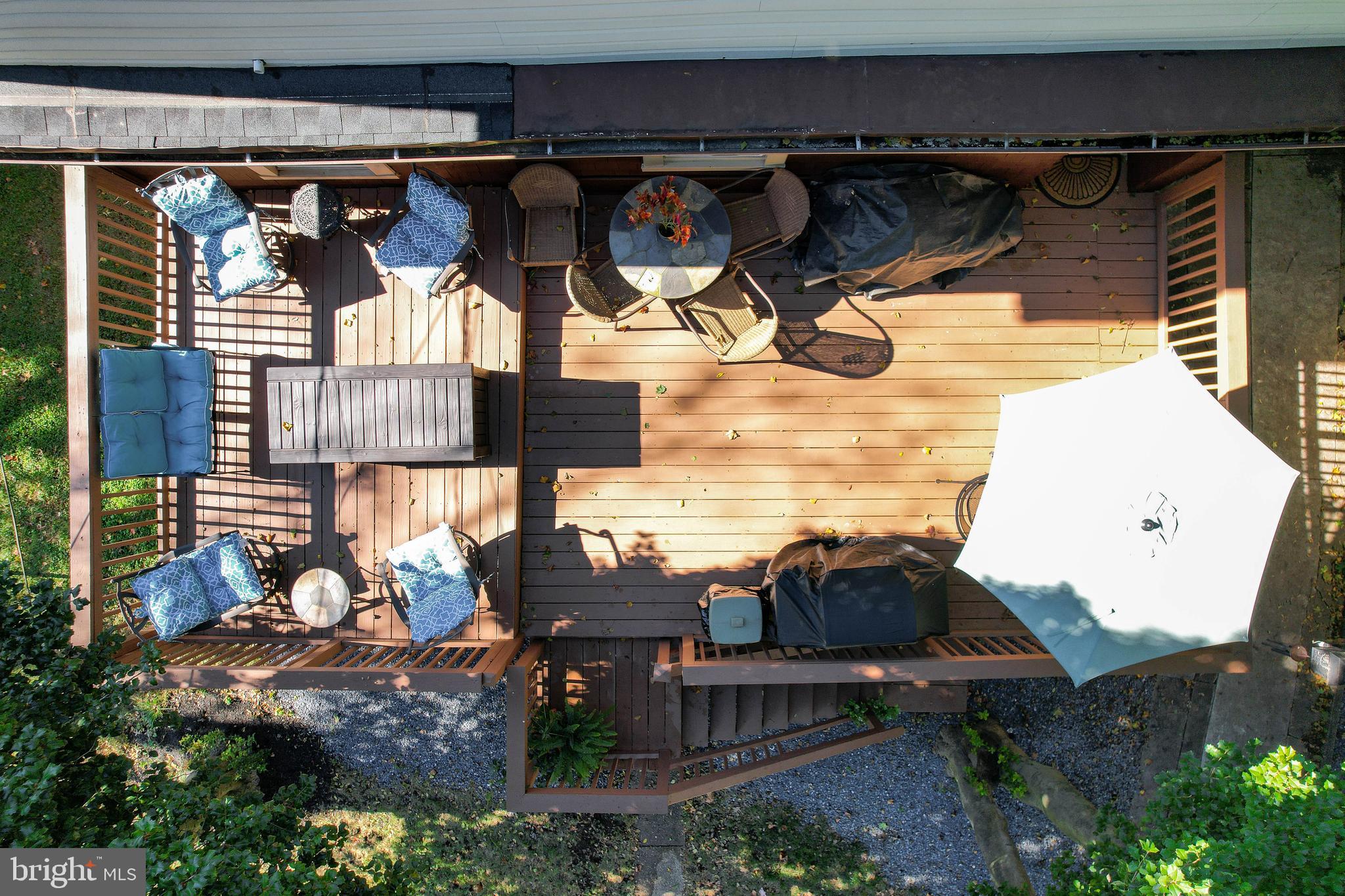 211 Mallow Hill Road Baltimore, MD 21229 - Photo 40 of 49 a view of a patio with a table and chairs