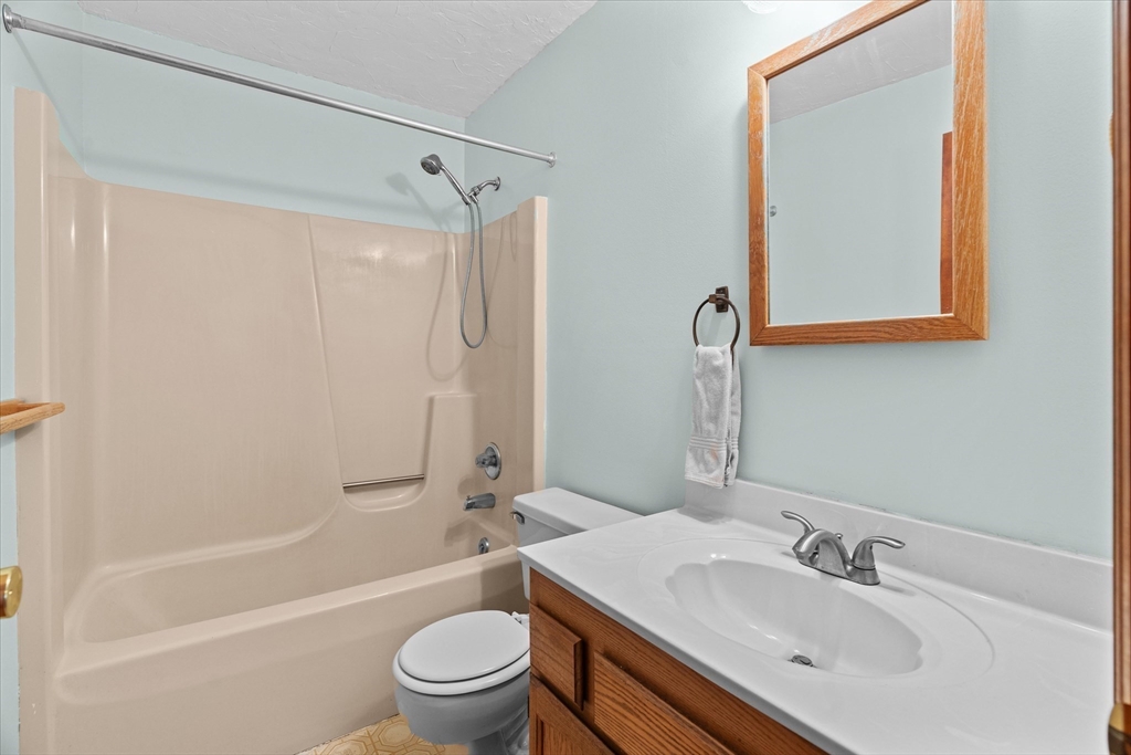 102 Valley Road Barre, MA 01005 - Photo 25 of 40 a bathroom with a sink a toilet and a bathtub