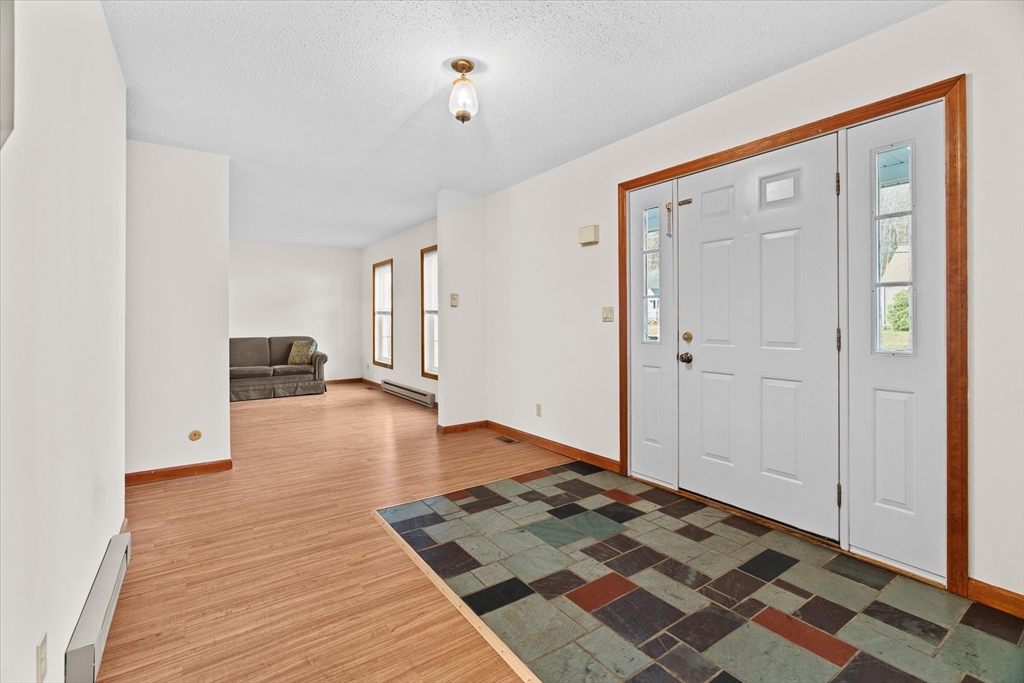 102 Valley Road Barre, MA 01005 - Photo 7 of 40 a view of kitchen with furniture and wooden floor