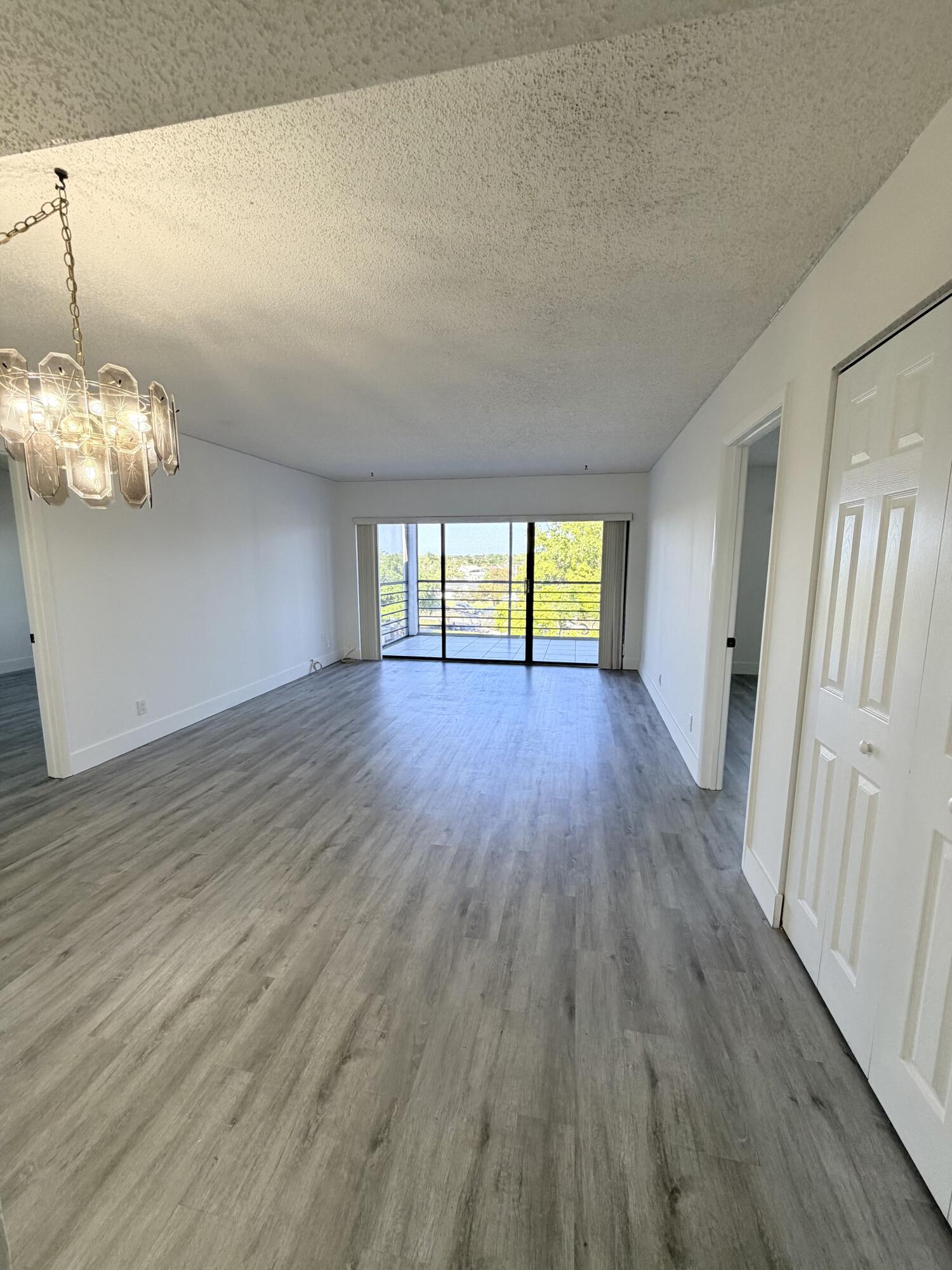 9235 Southwest 8th Street, Unit 512 Boca Raton, FL 33428 - Photo 2 of 25 Living Room
