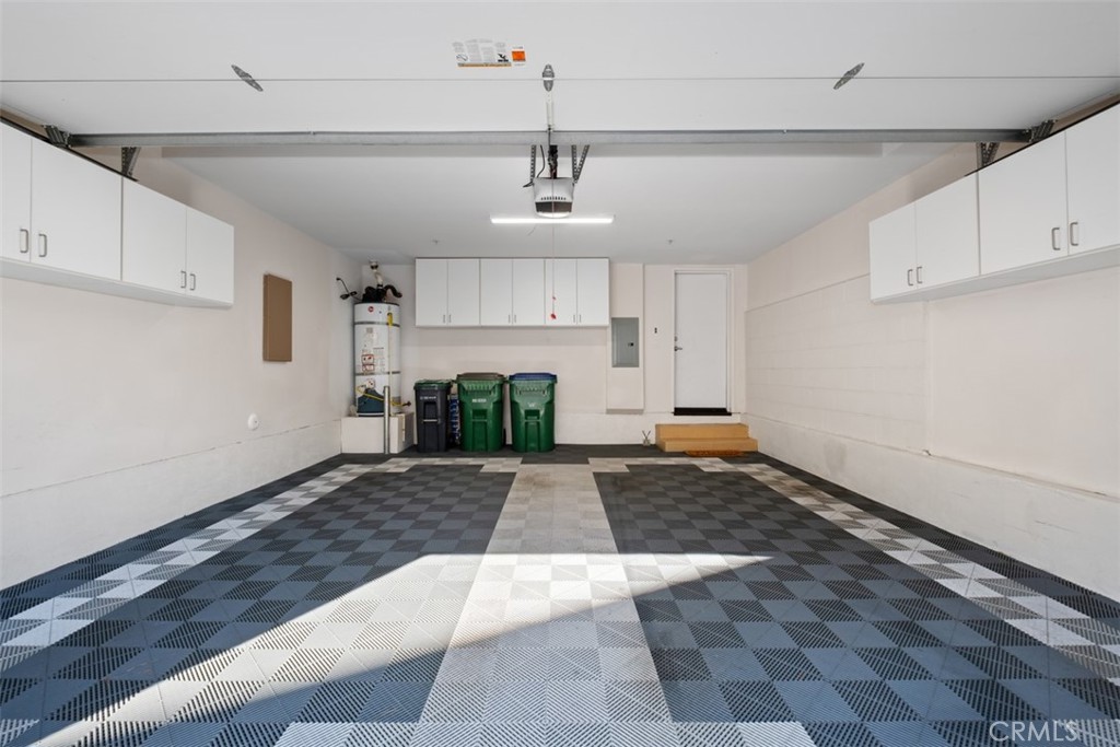 87 Lennox Irvine, CA 92612 - Photo 22 of 59 a view of a kitchen with wooden cabinet and a fireplace
