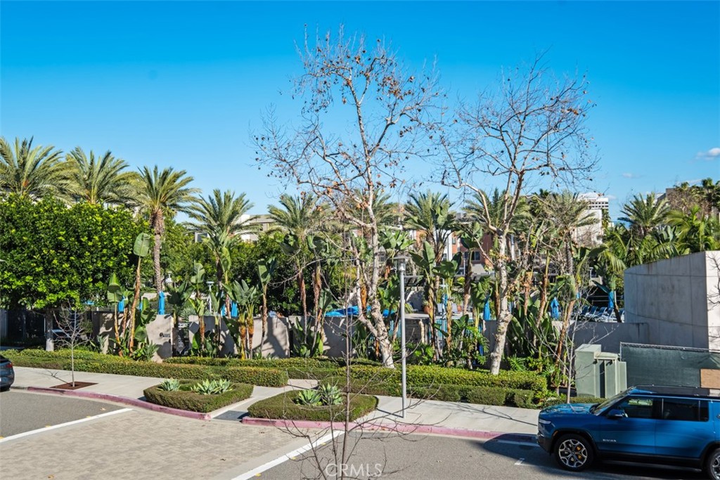 87 Lennox Irvine, CA 92612 - Photo 27 of 59 a cars parked on the side of a street