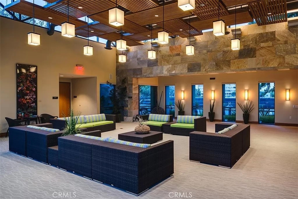 87 Lennox Irvine, CA 92612 - Photo 35 of 59 a living room with furniture and a potted plant