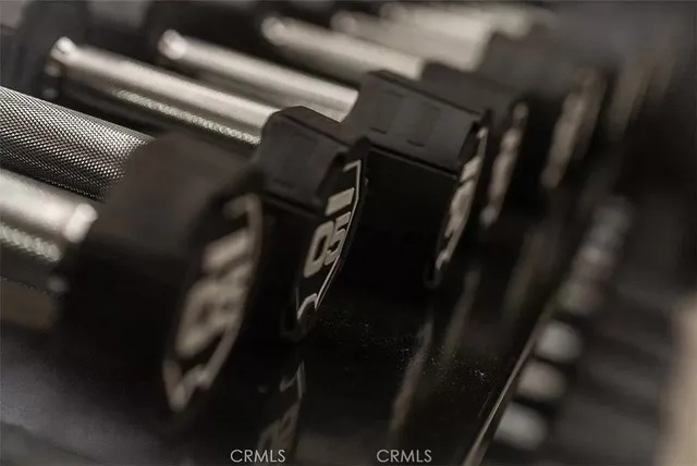 a view of a patio with a table and chairs