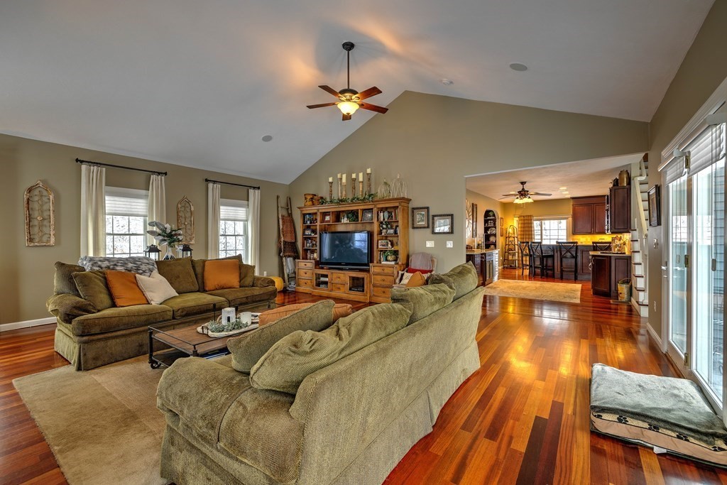 59 Lake Road Brookfield, MA 01506 - Photo 2 of 42 a living room with furniture and a chandelier
