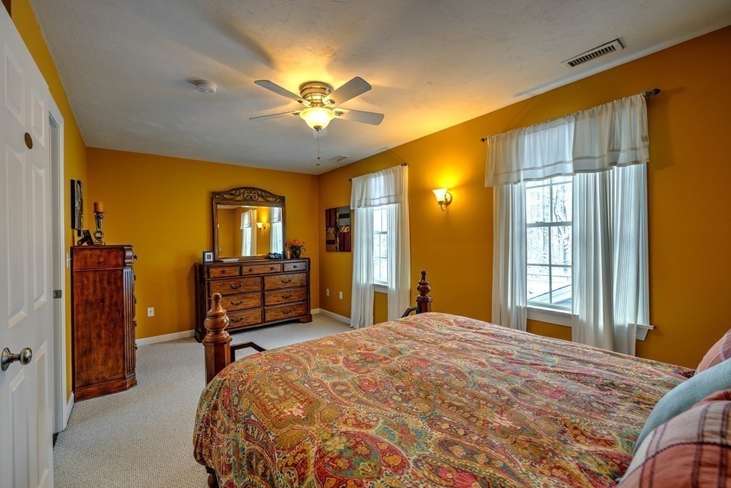 59 Lake Road Brookfield, MA 01506 - Photo 22 of 42 a bedroom with a bed dresser and a window