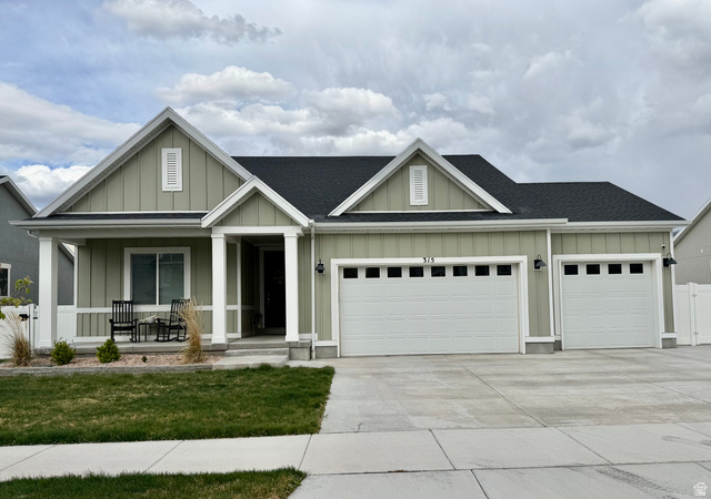 315 South Sherman Street Mapleton, UT 84664 - Photo 1 of 30 Contemporary ranch-style residence featuring light green board and batten siding with white trim