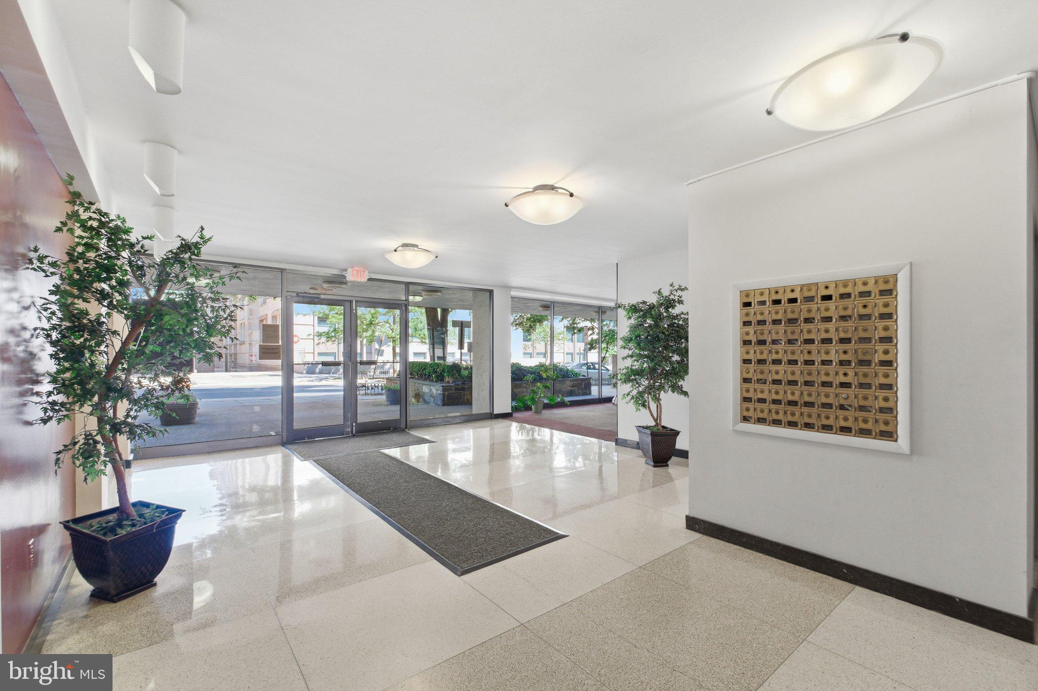 522 21st Street Northwest, Unit 407 Washington, DC 20006 - Photo 16 of 17 a lobby with furniture and floor to ceiling window