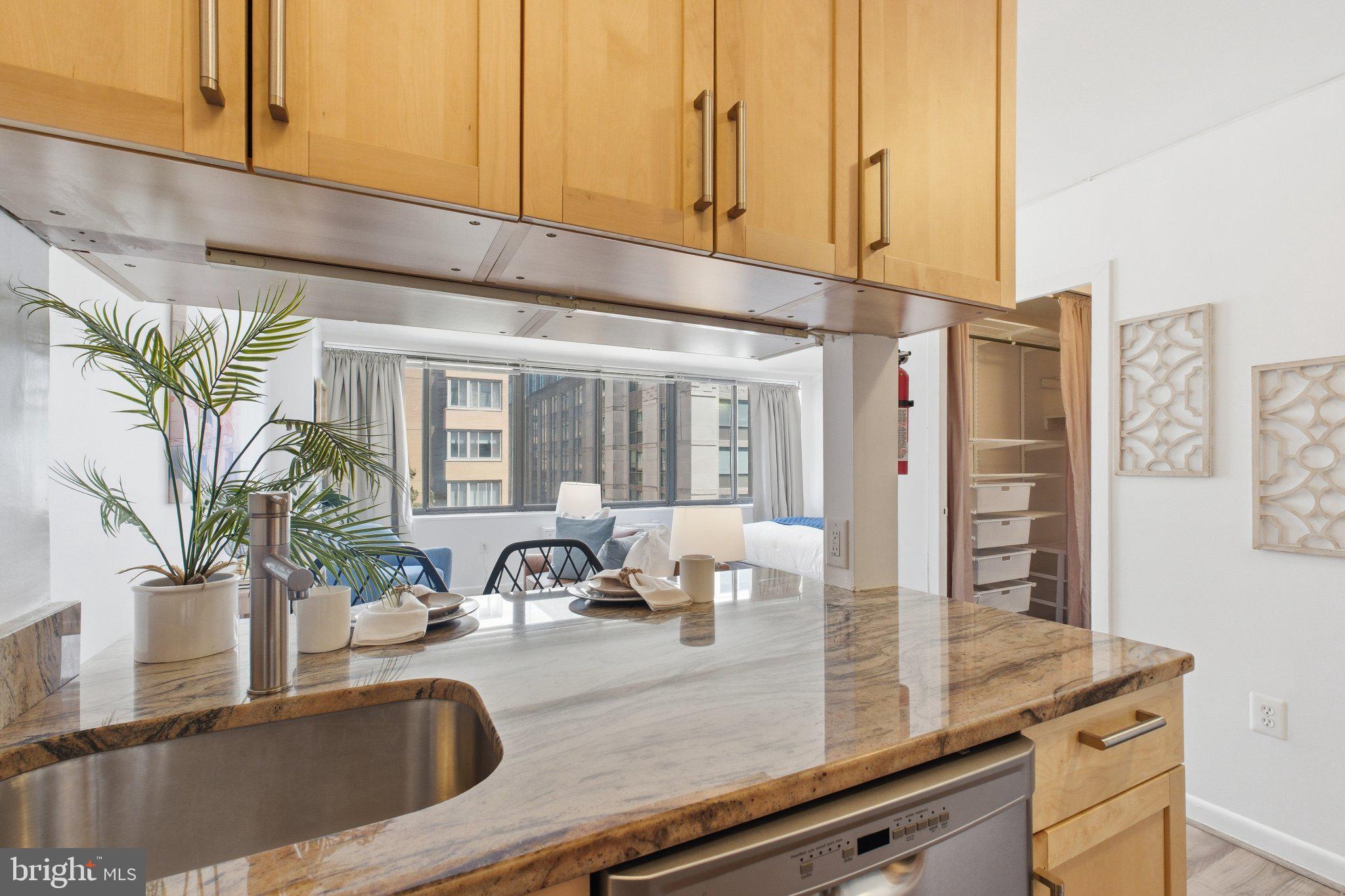 522 21st Street Northwest, Unit 407 Washington, DC 20006 - Photo 6 of 17 a kitchen with a sink and a window