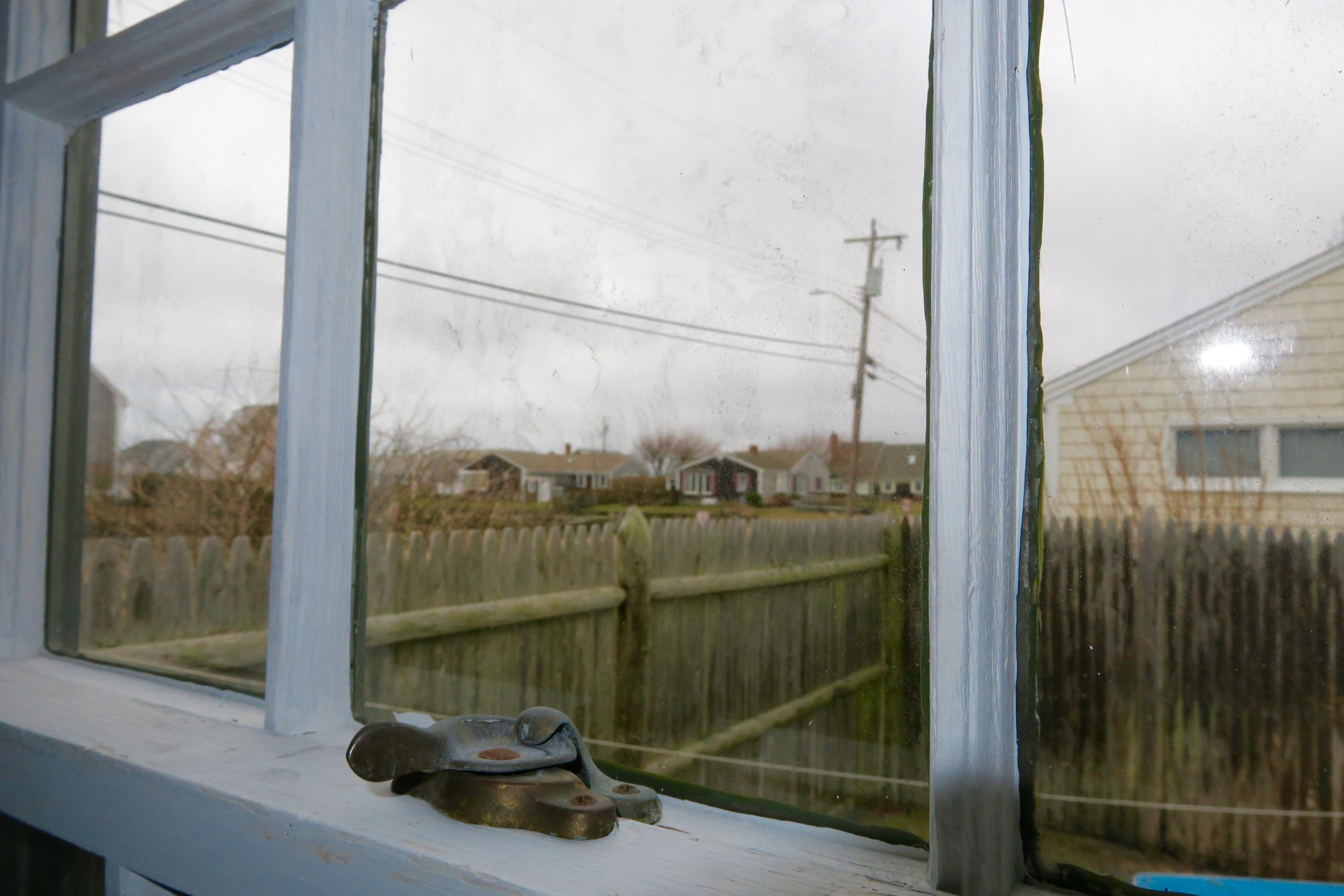 58 Surfside Road West Dennis, MA 02670 - Photo 14 of 31 a picture of a glass door and window