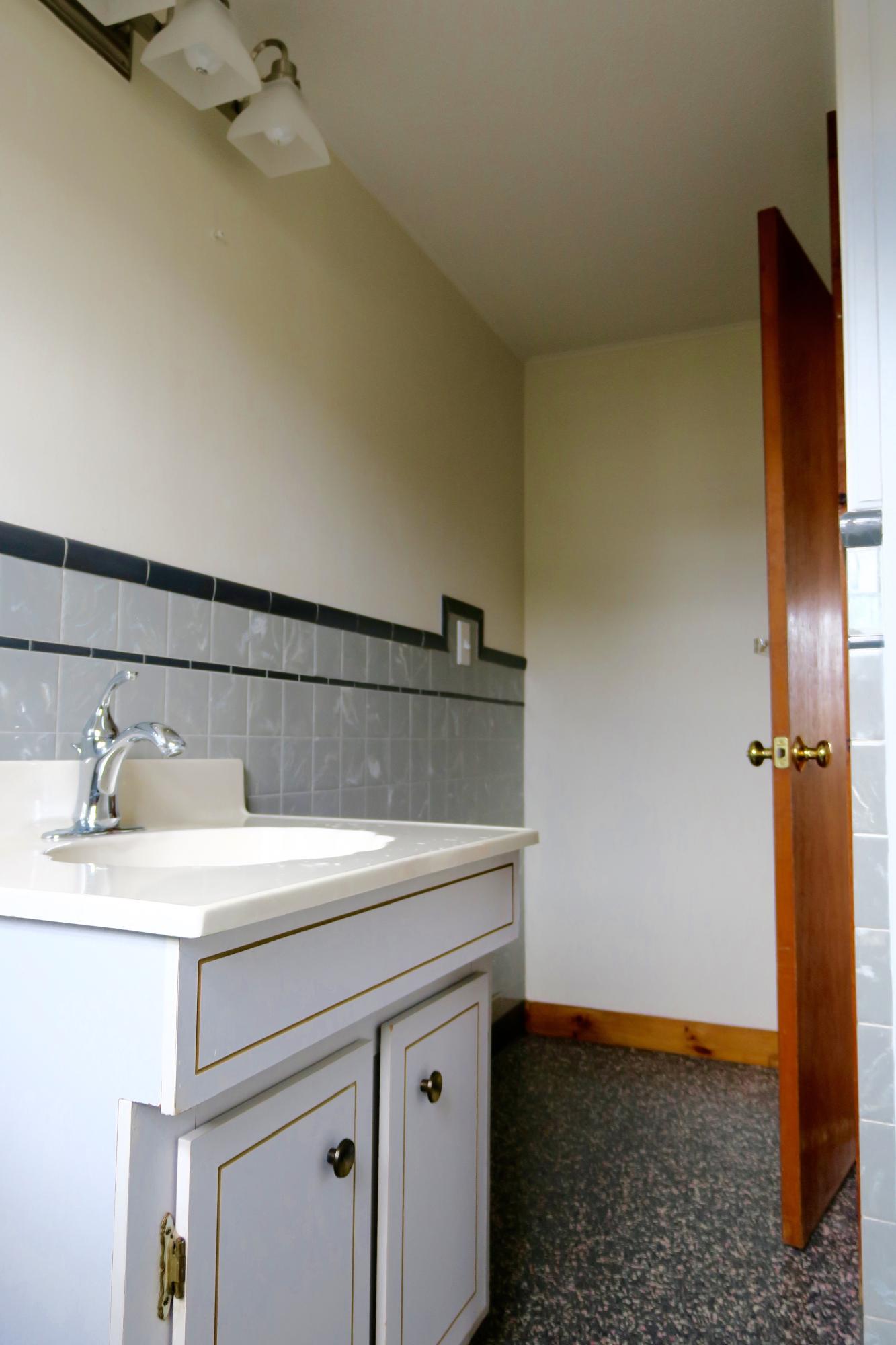 58 Surfside Road West Dennis, MA 02670 - Photo 16 of 31 a bathroom with a sink and a mirror
