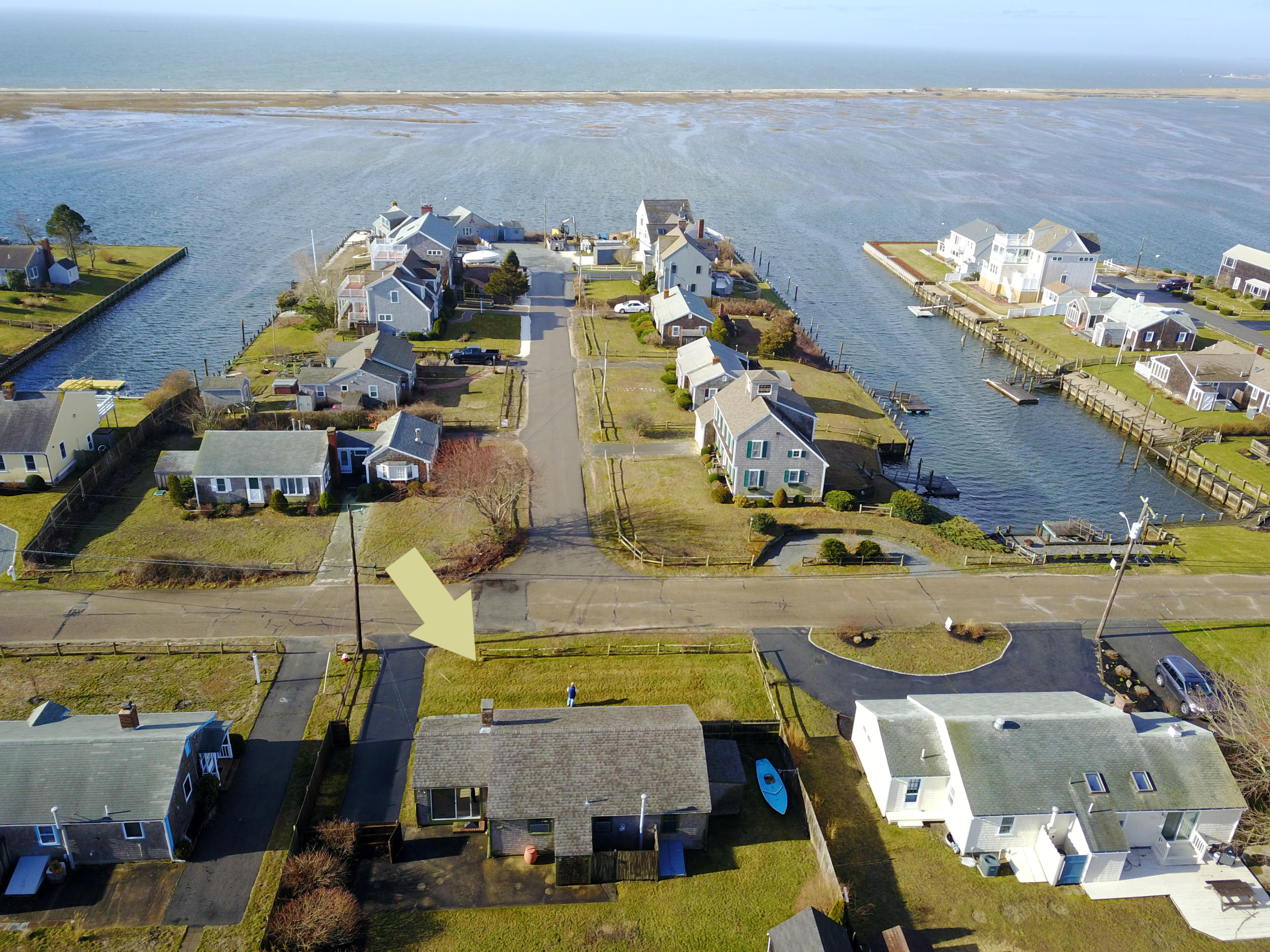 58 Surfside Road West Dennis, MA 02670 - Photo 2 of 31 a aerial view of a house with a ocean view