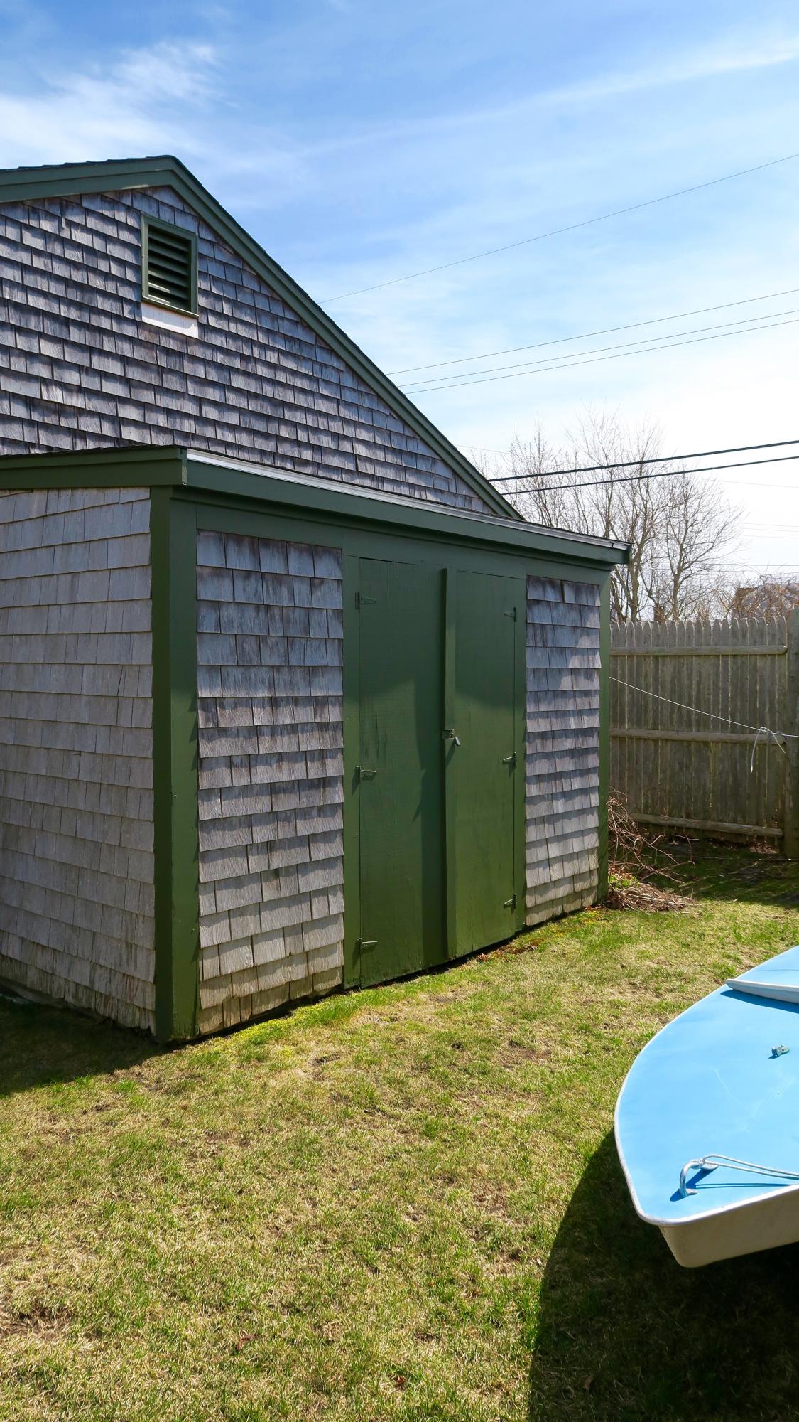 58 Surfside Road West Dennis, MA 02670 - Photo 27 of 31 a backyard of a house