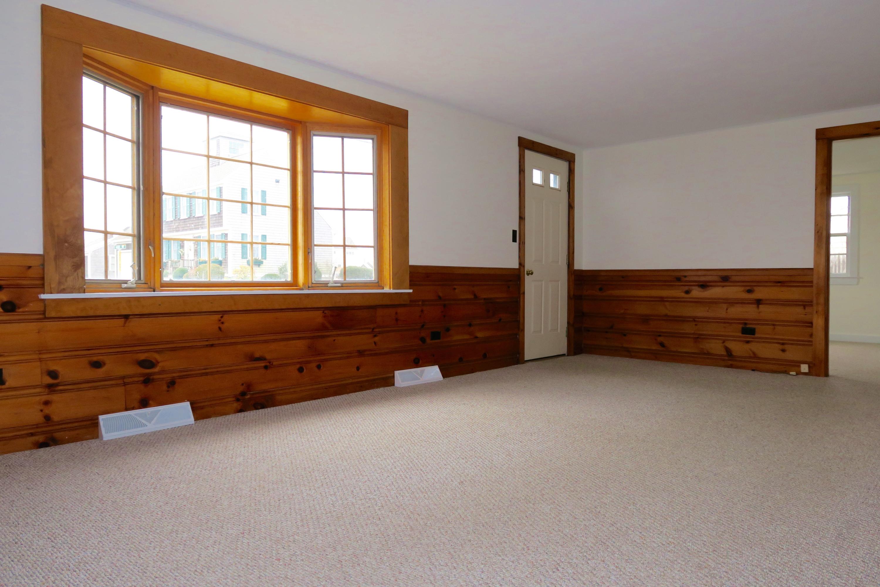 58 Surfside Road West Dennis, MA 02670 - Photo 7 of 31 an empty room with windows