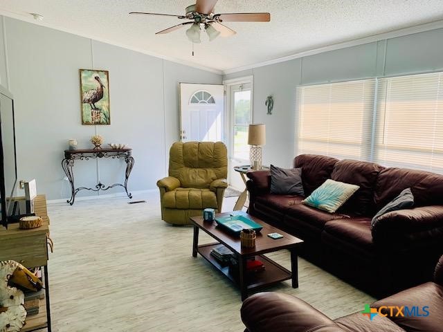 77 Blue Street Port O'Connor, TX 77982 - Photo 11 of 27 a living room with furniture and a window