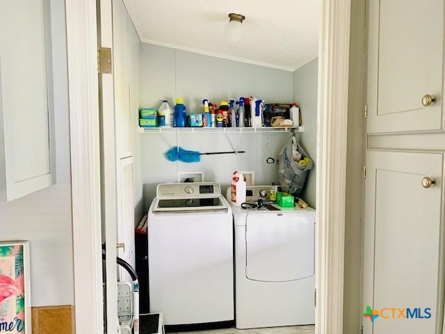 77 Blue Street Port O'Connor, TX 77982 - Photo 21 of 27 a storage room with washer and dryer
