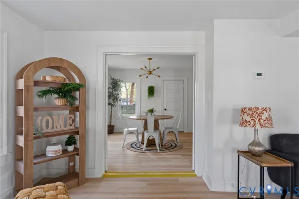 a view of a livingroom with furniture and wooden floor