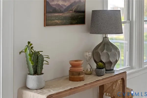a vase of flowers sitting on a table