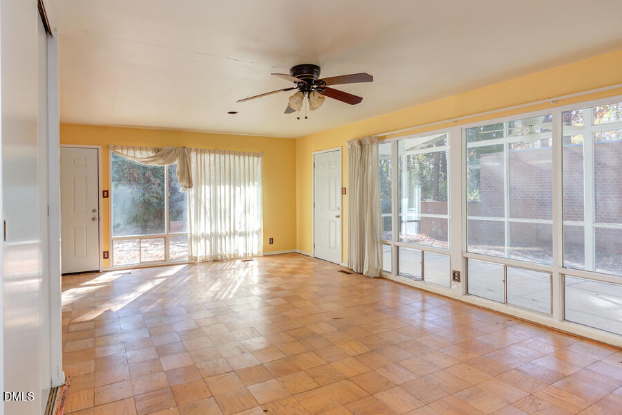 806 Kings Mill Road Chapel Hill, NC 27517 - Photo 16 of 45 a view of an empty room with a window