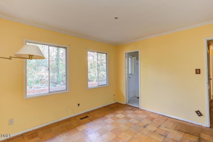 806 Kings Mill Road Chapel Hill, NC 27517 - Photo 25 of 45 a view of an empty room with a window