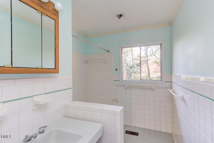 806 Kings Mill Road Chapel Hill, NC 27517 - Photo 26 of 45 a bathroom with a bathtub and a shower