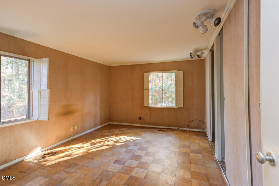 806 Kings Mill Road Chapel Hill, NC 27517 - Photo 27 of 45 a view of an empty room with a window