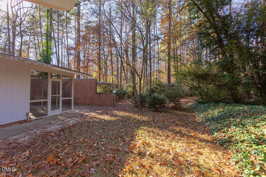 806 Kings Mill Road Chapel Hill, NC 27517 - Photo 29 of 45 a view of a house with a yard
