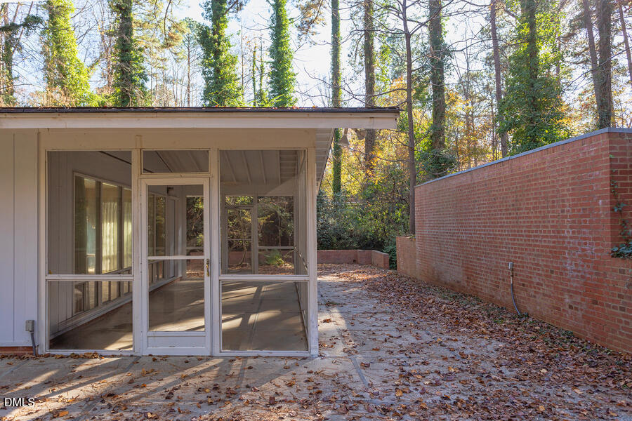 806 Kings Mill Road Chapel Hill, NC 27517 - Photo 30 of 45 a view of a house with a yard and balcony