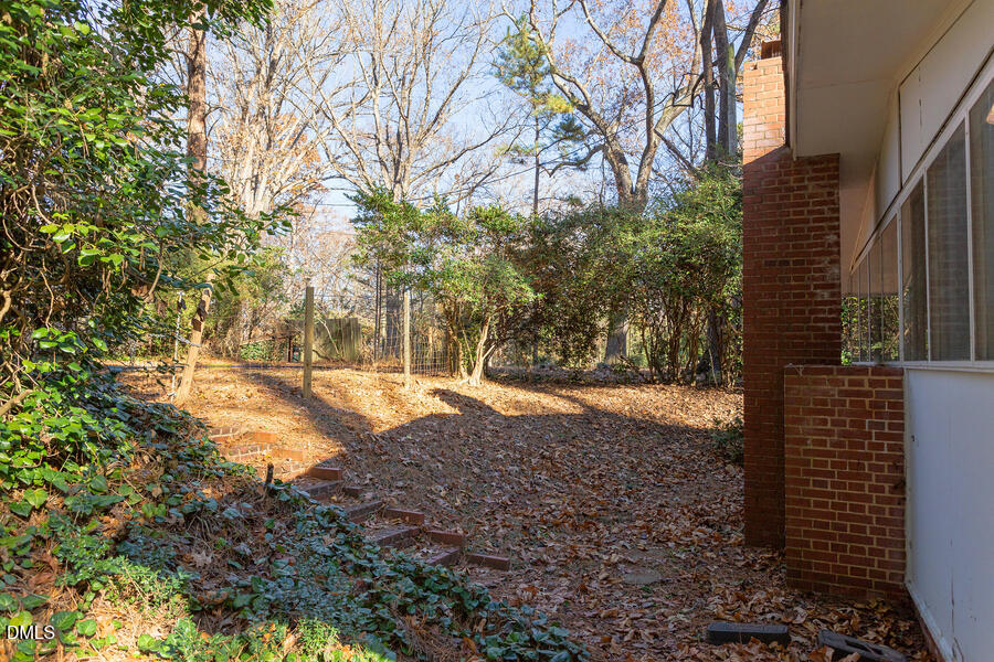 806 Kings Mill Road Chapel Hill, NC 27517 - Photo 31 of 45 a view of a yard with plants and trees