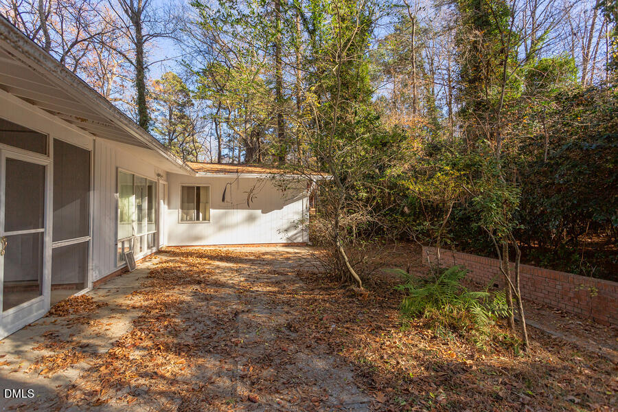 806 Kings Mill Road Chapel Hill, NC 27517 - Photo 35 of 45 a backyard of a house with lots of green space
