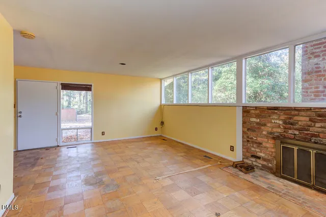 an empty room with windows