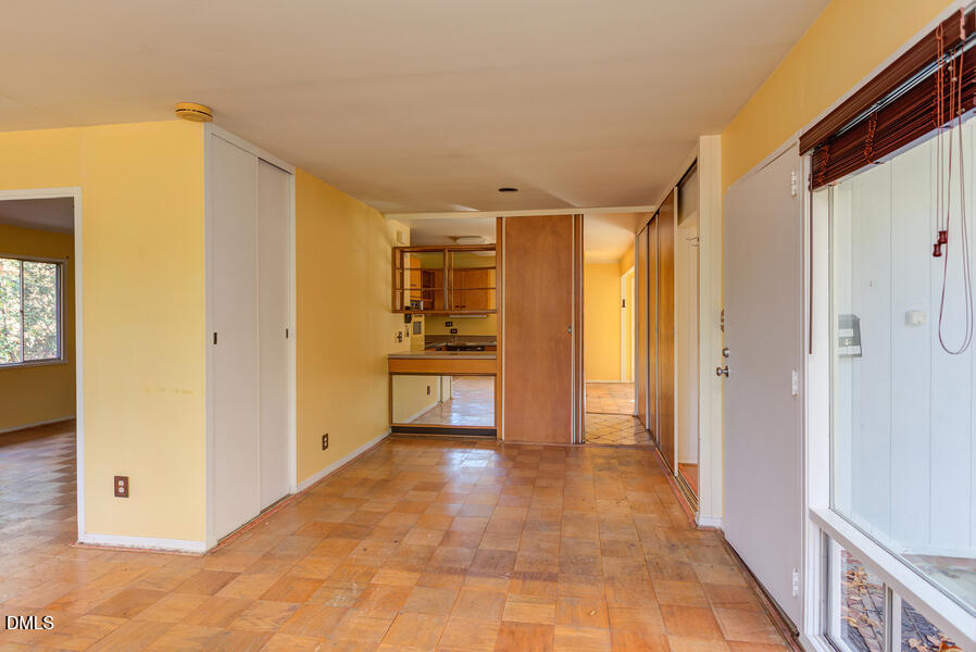 806 Kings Mill Road Chapel Hill, NC 27517 - Photo 10 of 45 a view of a kitchen with a refrigerator a sink and dishwasher white cabinets