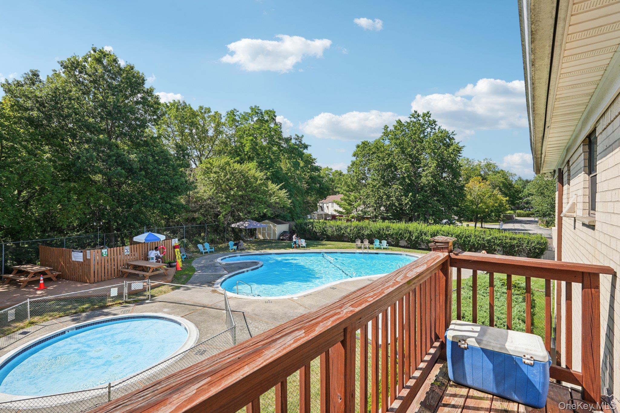 148 Sneden Place West, Unit 148 Spring Valley, NY 10977 - Photo 32 of 37 a view of a balcony with chairs
