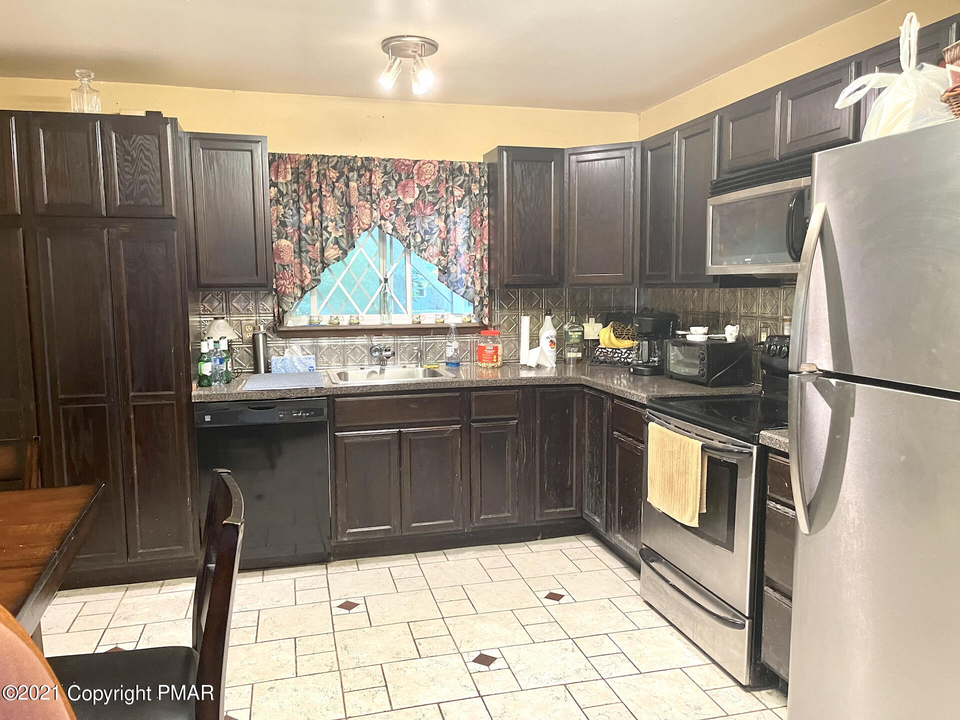 41 Old Post Road Tobyhanna, PA 18466 - Photo 7 of 14 a kitchen with stainless steel appliances granite countertop a refrigerator a sink a stove and dishwasher