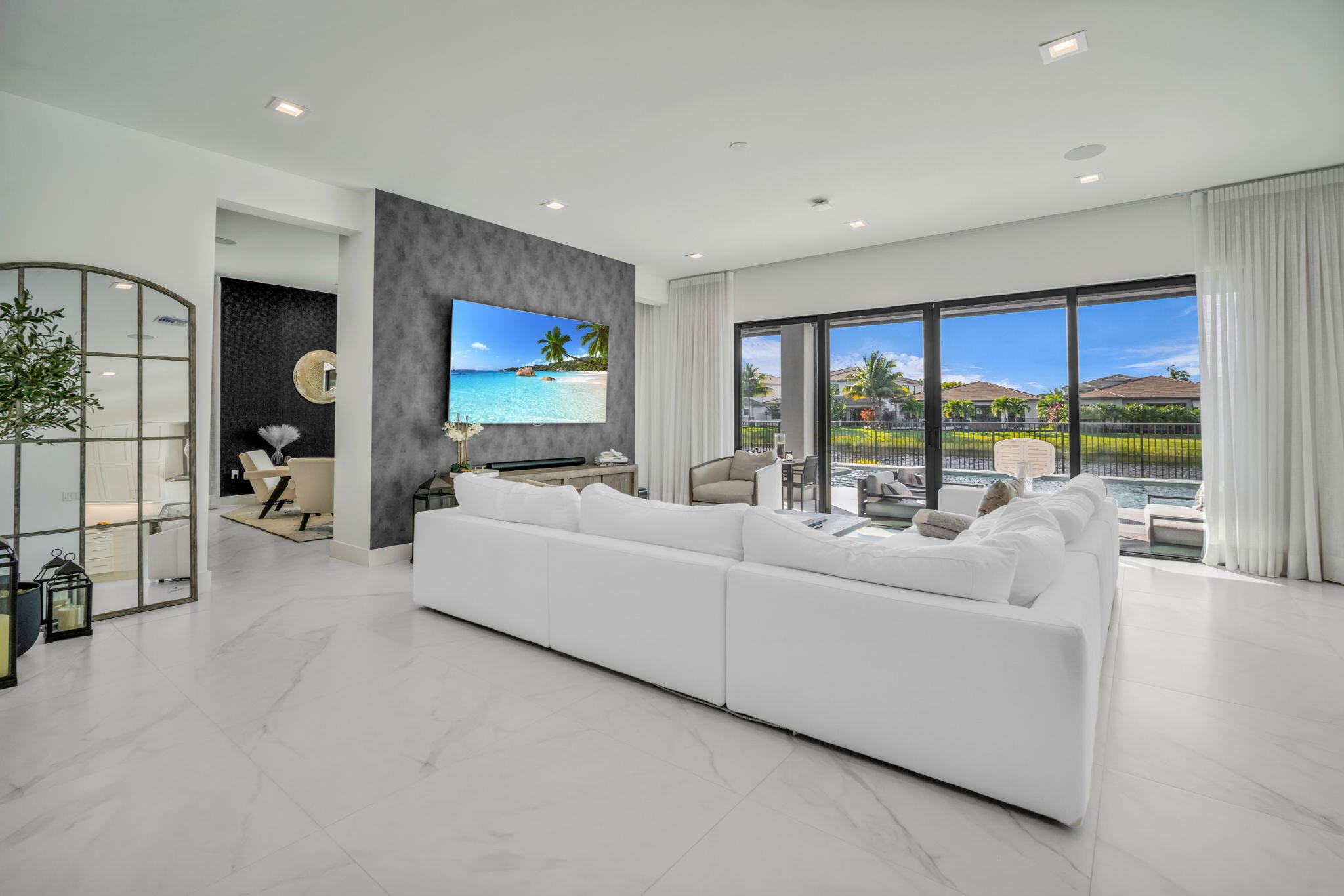 17059 Rainbow Fls Trail Boca Raton, FL 33496 - Photo 12 of 79 a living room with furniture and a flat screen tv