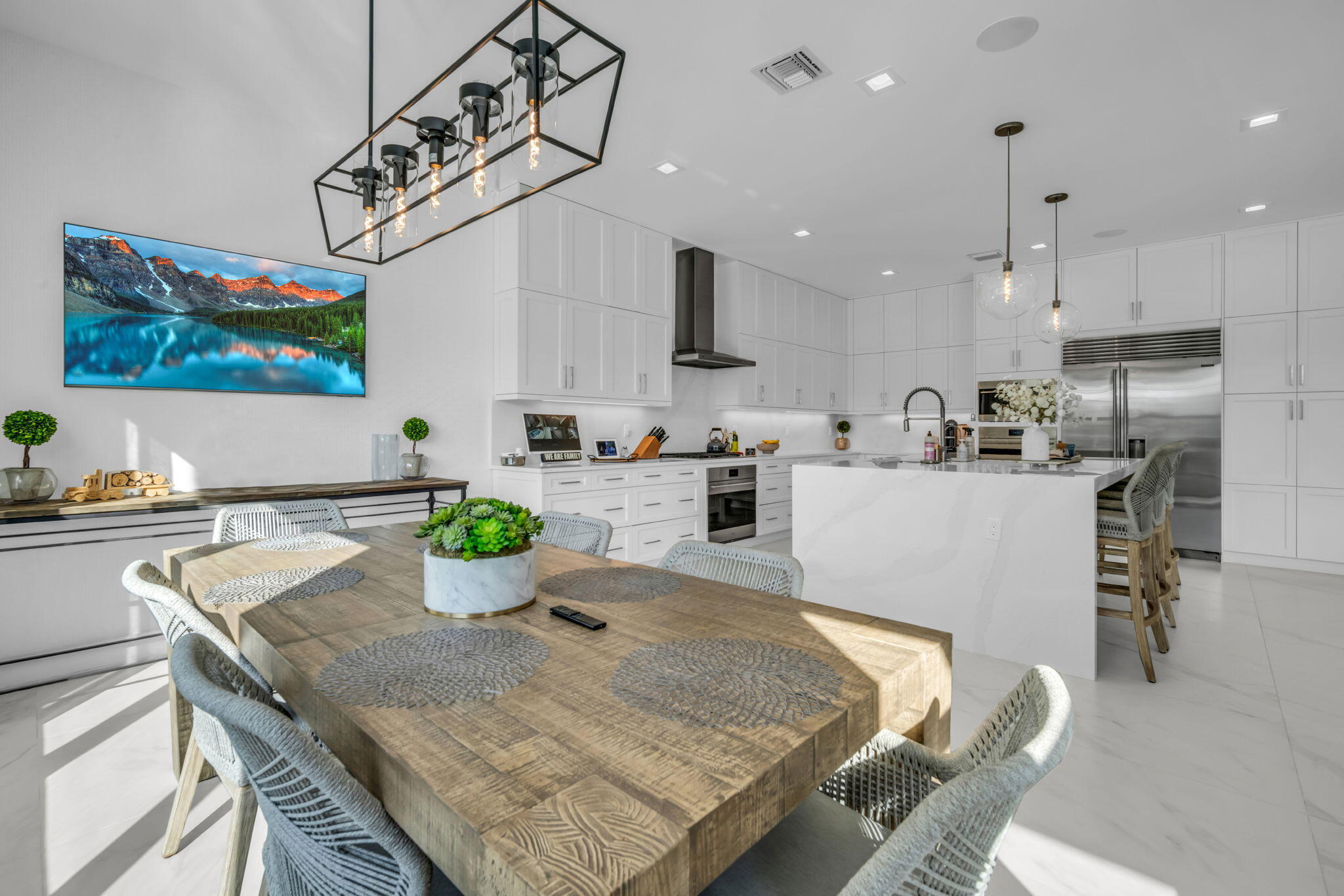 17059 Rainbow Fls Trail Boca Raton, FL 33496 - Photo 14 of 79 a kitchen with a table a sink and cabinets