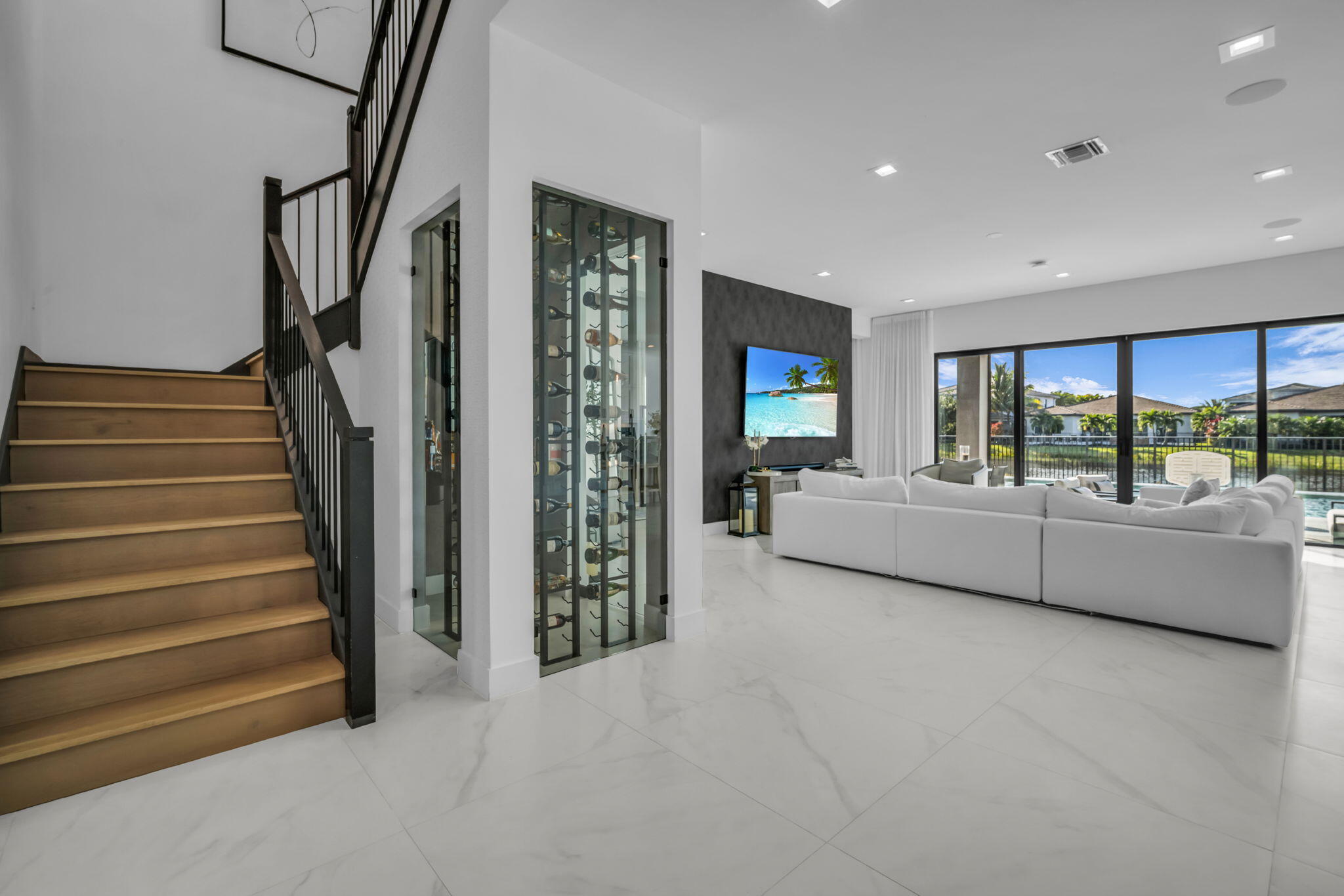 17059 Rainbow Fls Trail Boca Raton, FL 33496 - Photo 19 of 79 a living room with furniture and a large window