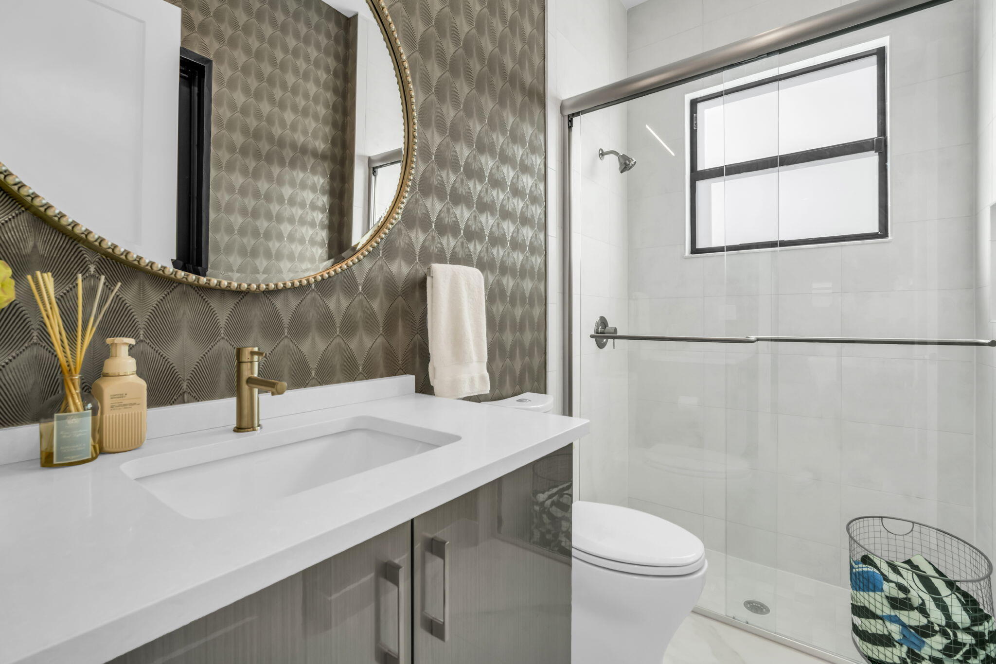 17059 Rainbow Fls Trail Boca Raton, FL 33496 - Photo 20 of 79 a bathroom with a sink a toilet and a mirror