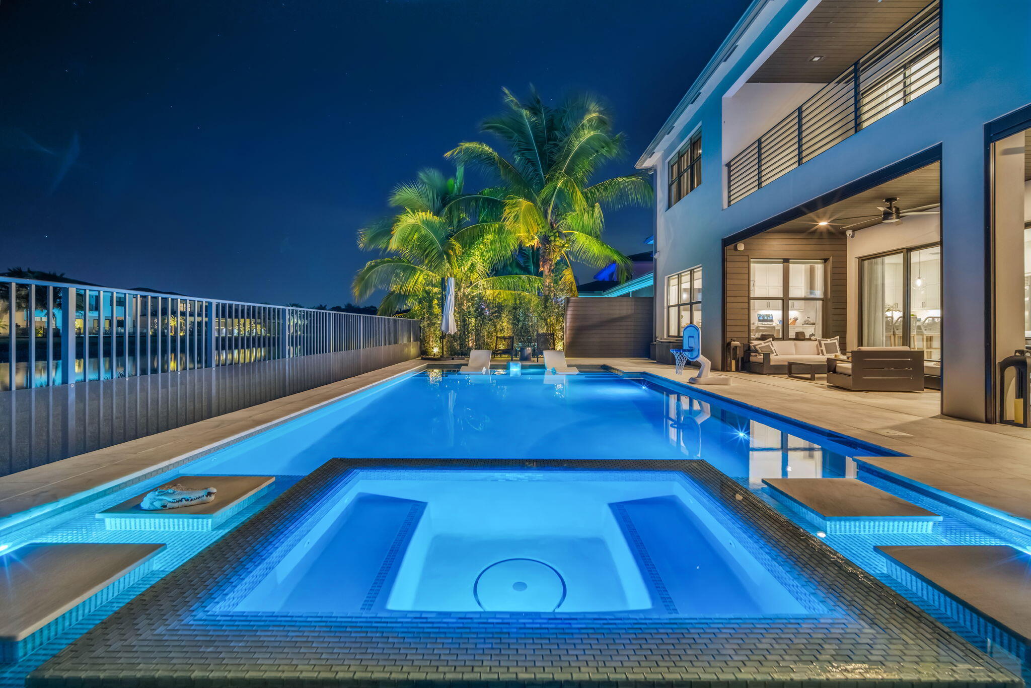 17059 Rainbow Fls Trail Boca Raton, FL 33496 - Photo 2 of 79 a view of swimming pool with a chair and tables