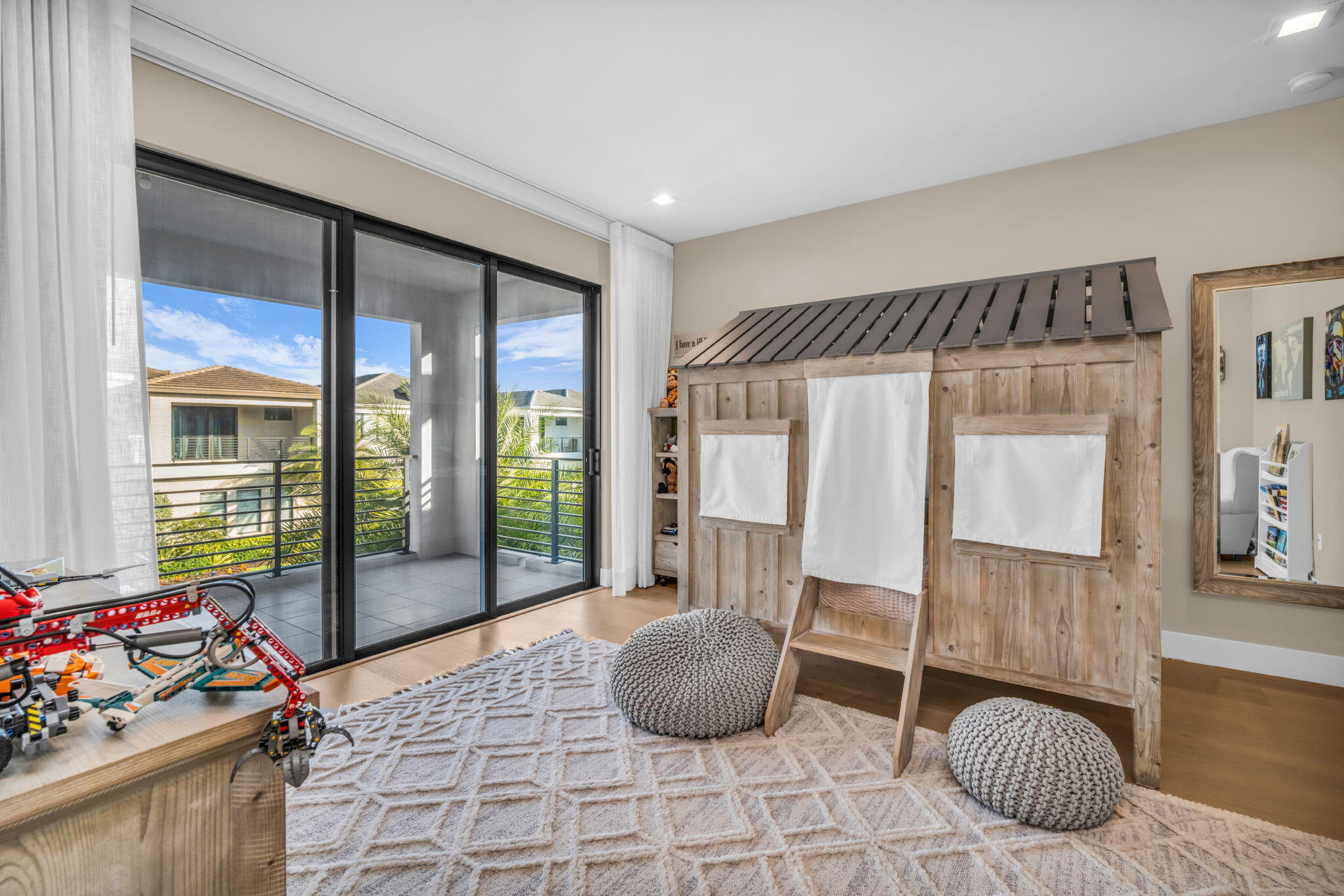 17059 Rainbow Fls Trail Boca Raton, FL 33496 - Photo 29 of 79 a bedroom with furniture and a large window