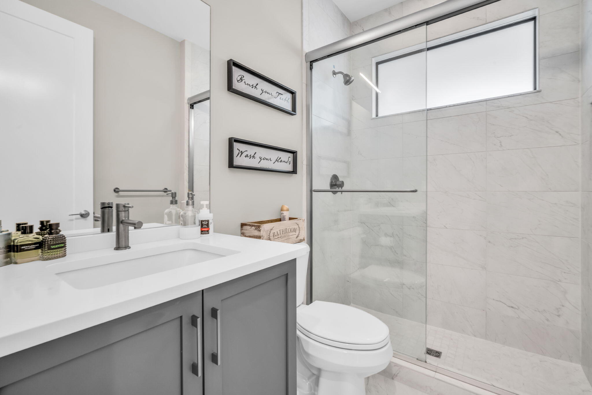 17059 Rainbow Fls Trail Boca Raton, FL 33496 - Photo 31 of 79 a bathroom with a sink toilet and shower