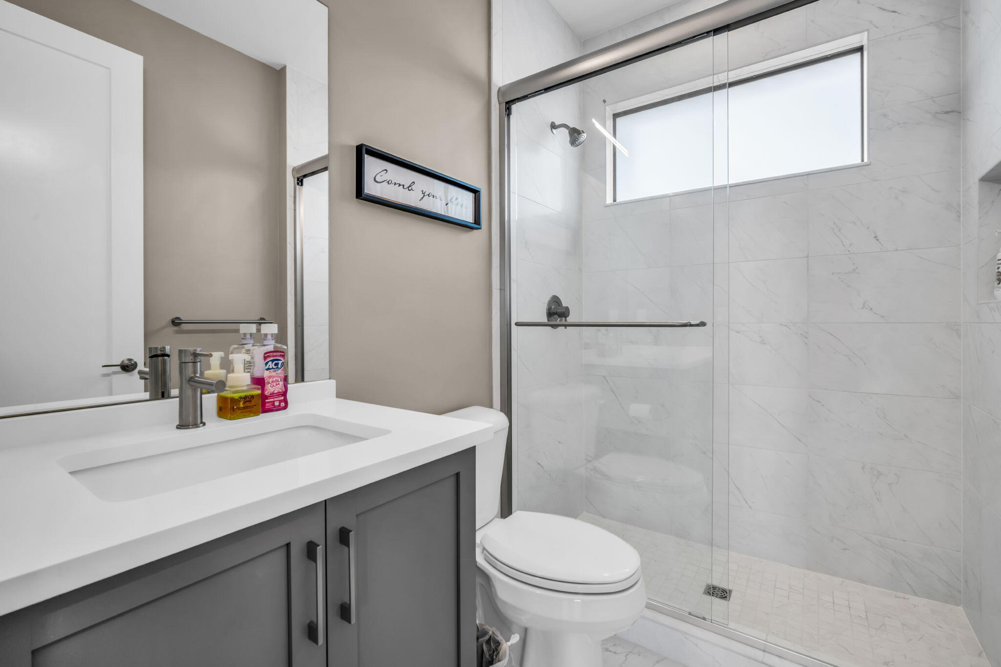 17059 Rainbow Fls Trail Boca Raton, FL 33496 - Photo 37 of 79 a bathroom with a sink and a mirror