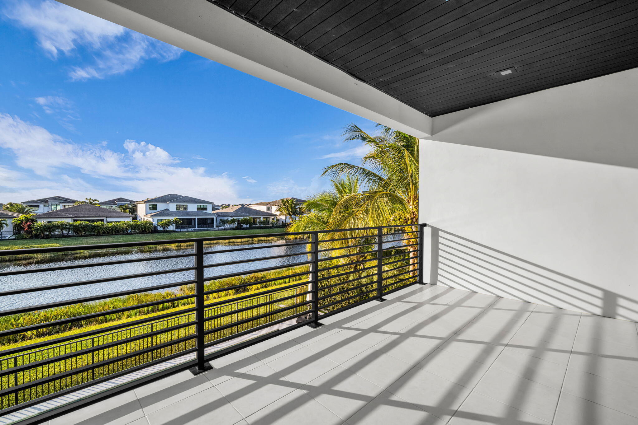 17059 Rainbow Fls Trail Boca Raton, FL 33496 - Photo 43 of 79 a view of outdoor space with wooden floor
