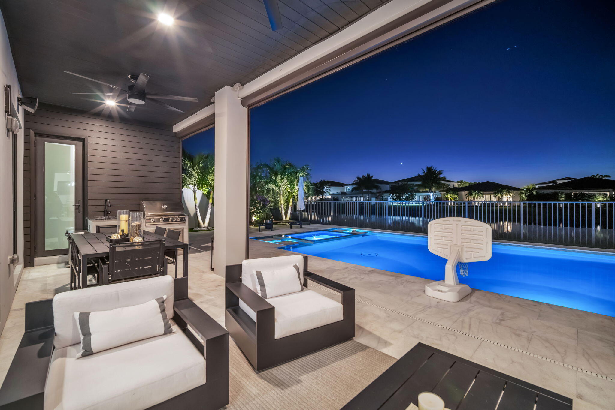 17059 Rainbow Fls Trail Boca Raton, FL 33496 - Photo 60 of 79 a view of a patio with couches and a fire pit