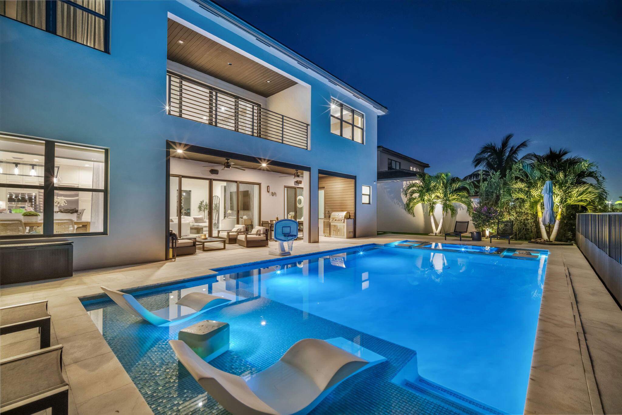 17059 Rainbow Fls Trail Boca Raton, FL 33496 - Photo 62 of 79 a view of a house with swimming pool and sitting area