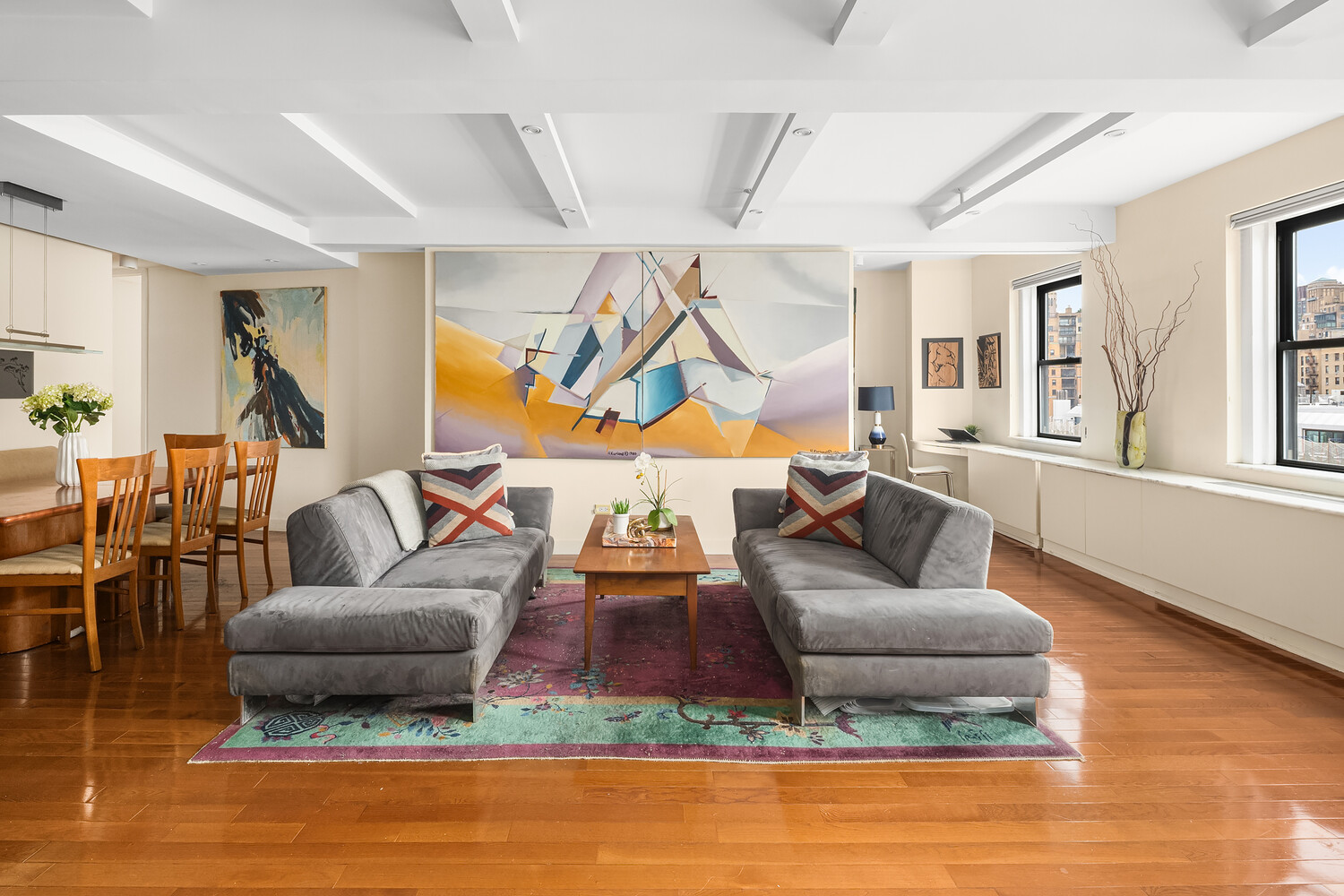 2166 Broadway, Unit 11B Manhattan, NY 10024 - Photo 2 of 14 a living room with furniture and a wooden floor