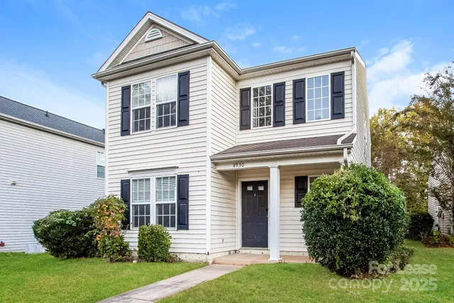 a house view with a garden space