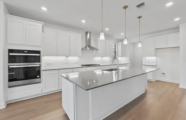 a picture of a bathroom with a sink